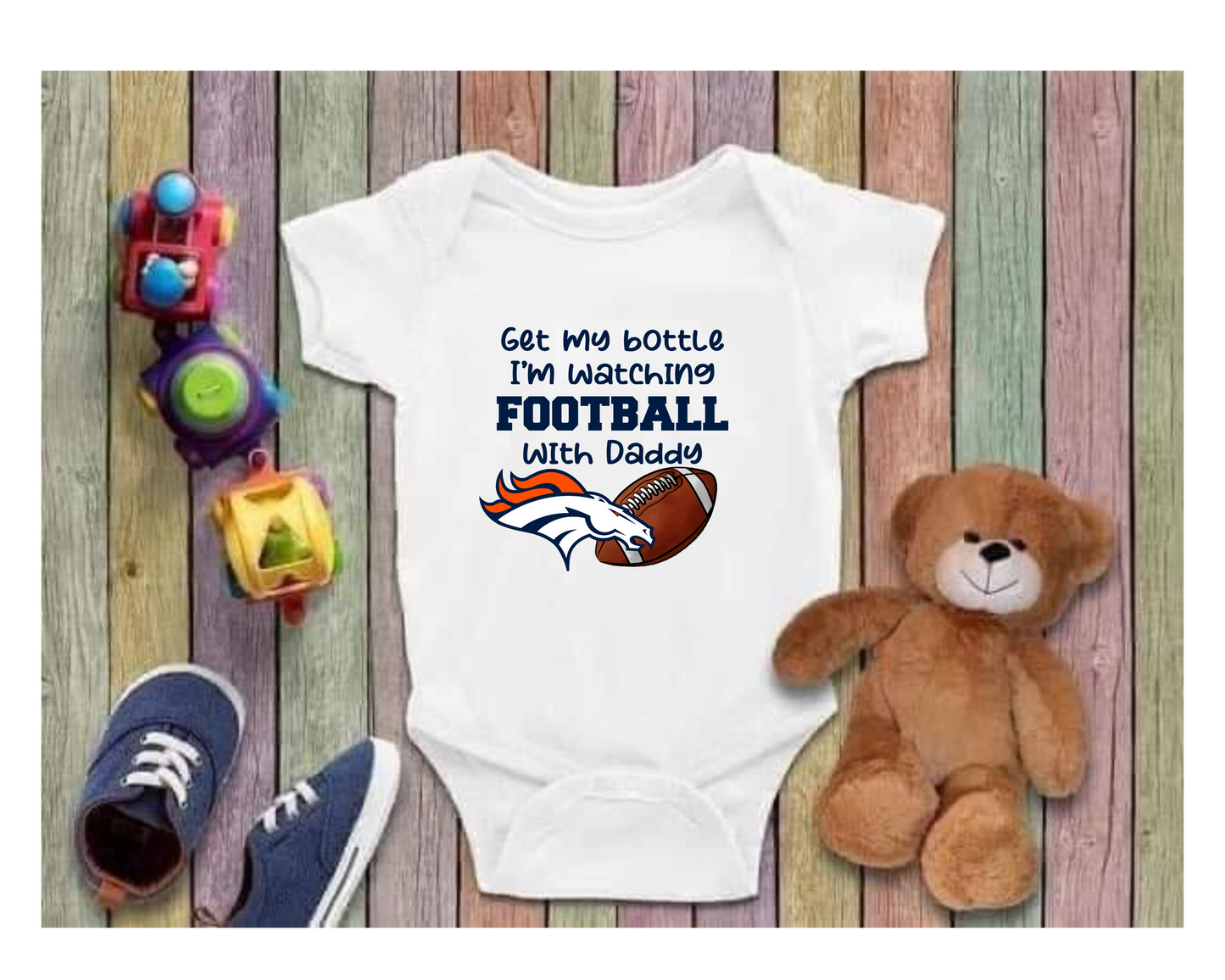 GET MY BOTTLE IM WATCHING FOOTBALL WITH DADDY